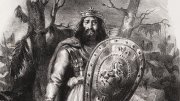 An illustration of a Celtic warrior with a shield in grey