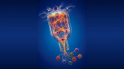 A glowing bulb shape surrounded by colorful, swirling energy lines against a blue background.