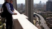 President Faust and Rahul Mehrotra, chair of the Graduate School of Design’s department of urban planning and design, look out over Mumbai.