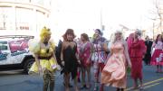 Hasty Pudding members donned outfits ranging from a neon-yellow bee costume to striped tights, glitter make-up, and high heels.