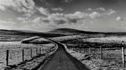 black and white scence of long road