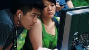 Louie and director Tze Chun check a monitor during production.