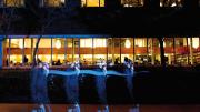 Students study for finals at night in Lamont Library, open 24 hours.