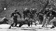 Harvard at Army, 1948: The Black Knights won, 20-7. The ball carrier is Chuck Roche ’50. 