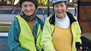 While cycling the East Coast Greenway, Linda Cabot Black and Elizabeth Brody pause for some Florida sunshine. 