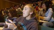 ...while Julia Pederson ’07 registers her answer with a handheld clicker...
