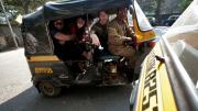 Gitangu, Ayuningtyas, Abdul Rahman, and Potter cram into an auto-rickshaw for the ride back to their hotel at the end of the day.