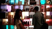 Another group advised a company on introducing a new line of hair-care products. Here, M.B.A. student Nafis Atiqullah (right) examines a product display at a hair salon. At left is Riddhi Paleja; her aunt, the Harvard students' local guide, brought her along for the day because she thought the students might find it informative to interview her. She is, her aunt said, "the only person I know who uses a lot of hair products."