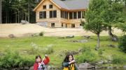 Paddling on Long Pond with the Appalachian Mountain Club’s Gorman Chairback Lodge in the background