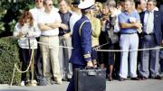 A military aide to President George H.W. Bush carries the &ldquo;nuclear briefcase,&rdquo; cabled to his wrist, in 1991. 
