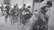 Moulton (at right) leads a mission in Najaf.