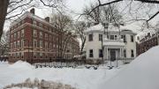 The white wood frame house will become the Winthrop House Master's residence. An addition will connect it to Gore Hall, at left.