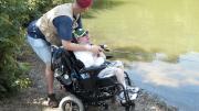 Tim Stevens, a longtime patient, fishes with his stepfather.