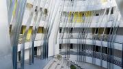 The interior courtyard of the New Carver Apartments offers outdoor space isolated from the sounds of the nearby freeway.
