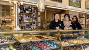 Alejandra Ramirez, Olivia Hitchens, and Gabriela Ramirez (from left to right) preside over the goods at Antoine’s Pastry Shop in Newton.