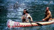 Movie still showing Winnetou and Old Shatterhand paddling a canoe