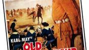 A movie poster advertising Old Shatterhand, showing the frontiersman tied to a stake