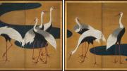 A grouping of Japanese cranes against a gold background