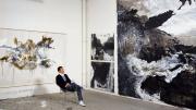 Artist Shen Wei in his studio amid his large-scale abstract paintings 
