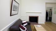 Photograph by Rose Lincoln/Harvard News Office Common room fireplace