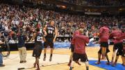 The celebrating fourteenth-seeded Harvard Crimson led almost the entire game and held off a late New Mexico rally to top the third-seeded Lobos, 68-62.