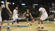 In the NCAA basketball tourney, Agunwa Okolie handles the ball for Harvard. The Crimson will face Michigan State on March 22.