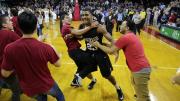 After the game, Wesley Saunders ’15 and his teammates could finally relax (and celebrate) as the Harvard student section stormed the floor.