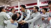 The Harvard men celebrate their championship win.