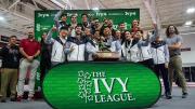 The Ivy champion men pose with their first-place trophy.