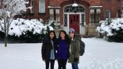 The author and her two roommates stand in the snow in front of their future home at Harvard.