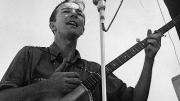 Pete Seeger, shown singing in an undated photo, traveled light, always ready to make music.