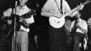 Woody Guthrie (left) and Seeger in 1941; they first met in 1939.