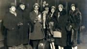 Diaghilev with members of the company, on tour at the train station in Liverpool, England, 1928