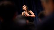 Wenqian (“Wendy”) Wang ’10, who interned in Beijing last summer, closes the March 18 banquet with a rousing version of <i>“Wo ai ni Zhongguo”</i> (“I Love You, China”).