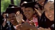 Seniors lining the Yard walkways applaud the dignitaries, professors, and alumni and alumnae who precede them into Tercentenary Theatre (1996).
