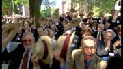 Members of the class of 1948 tip their straw hats in a show of fiftieth-reunion pride.