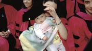 Maria V. Mavroudi, Ph.D. ’98, of Berkeley, California, caps her son George.