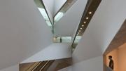 The new building’s 87-foot-high, spiraling “Lightfall” atrium