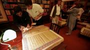 The Chowmahalla's library includes a collection of rare, antique Korans given as gifts to the royal family. (Princess Esra is at right, in blue.)