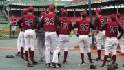 Harvard players near the batting cage.