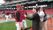 Harvard players are interviewed by a local news station.