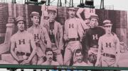 The JunboTron showed Harvard baseball photographs from years past.