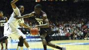 All-Ivy forward Kyle Casey ’13 drives toward the hoop against Vanderbilt’s Rod Odom.