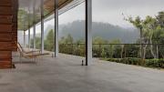 Deck chairs look out over the tea fields.