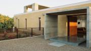 Another country house was built in the middle of an orchard. Mehrotra convinced the owner to place the house in the center rather than at the edge of the property "like a plantation." 