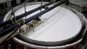 At the Steward Observatory Mirror Lab, in Tucson, staff load the rotary kiln with 20 tons of chunks of borosilicate glass. 