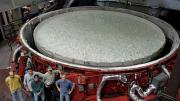 At the Steward Observatory Mirror Lab, in Tucson: with the raw glass in place, the rotary kiln can be covered and prepared for heating.