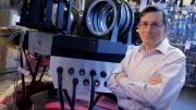 Daniel Fabricant, of the Smithsonian Astrophysical Observatory, an early leader in the GMT&rsquo;s design, appears with a spectrograph under construction in Cambridge. 
