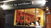 Modern Chinese food at East by Northeast includes pork buns, lamb meatballs, and egg noodles with spicy calamari and watermelon slaw. 