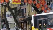 Lest anyone forget, Vietnam remains a Communist Party state, as a street decoration in central Hanoi suggests.